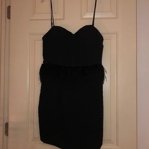 Mini black dress with feather detail